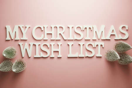 Christmas Wish List alphabet letter on pink backgroundの写真素材