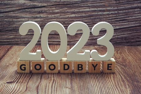 Goodbye 2023 alphabet letter on wooden backgroundの写真素材