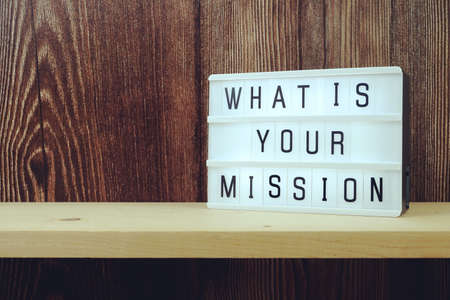 What is your Mission word in light box on wooden backgroundの写真素材