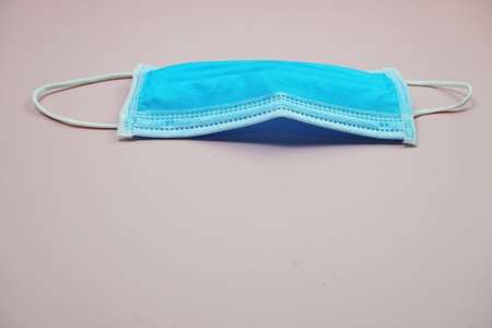 Medical Mask with space copy on pink backgroundの写真素材