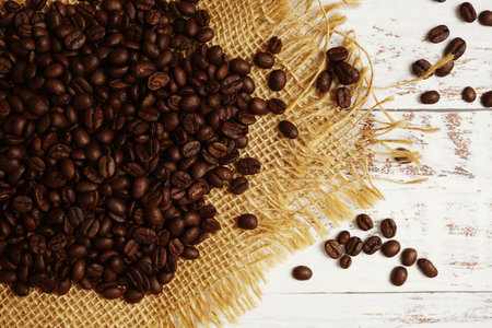Roasted Coffee Beans on wooden background