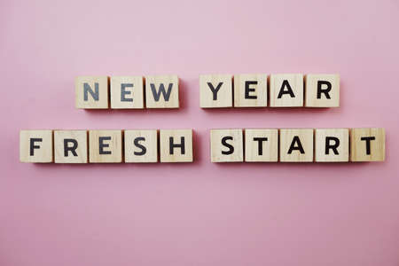 New Year Fresh Start alphabet letter on pink backgroundの写真素材