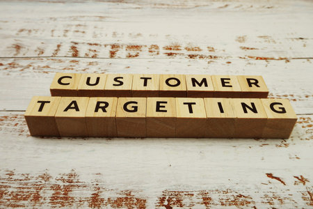 Customer Targeting Word alphabet letters on wooden background