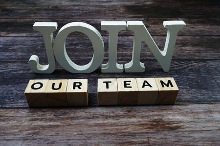 Join our team Word alphabet letters on wooden backgroundの写真素材