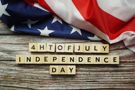 Fourth of July Independence Day alphabet letter on wooden backgroundの写真素材