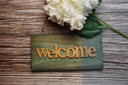 Wooden Welcome sign with space copy on wooden backgroundの写真素材