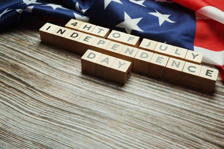 Fourth of July Independence Day alphabet letter on wooden backgroundの写真素材