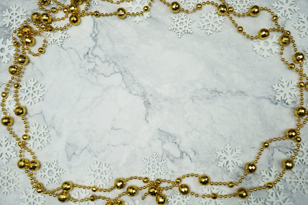 Christmas Ornament border frame on marble ackground