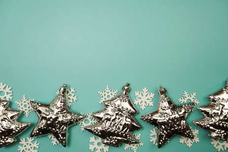 Flat lay composition with Christmas decorations accessories on blue backgroundの写真素材