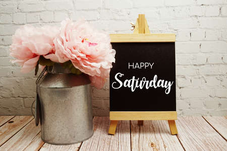 Happy Saturday typography text on easel wooden boardの写真素材