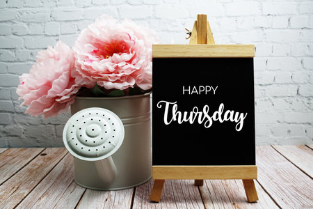 Happy Thursday typography text on easel wooden boardの写真素材