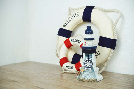 Lifebuoy Summer  Interior decoration with space copy on wooden backgroundの写真素材