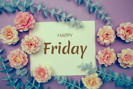 Happy Friday typography text and flower decorate on purple backgroundの写真素材