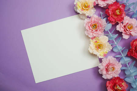 Mockup with Spring Flowers and invitation greeting cardの写真素材