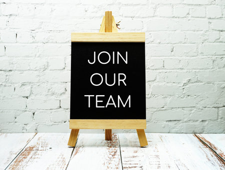 Join Our Team typography text on Easel wooden