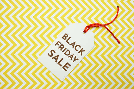 Black Friday Sale tag on yellow backgroundの写真素材