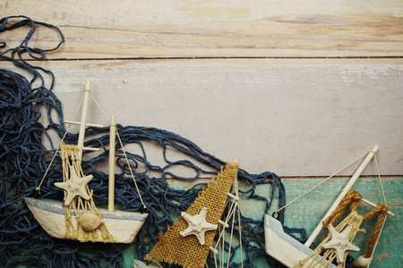 Nautical and summer background top view on wooden backgroundの写真素材