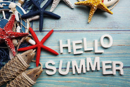 Hello Summer alphabet letters with marine decoratio on wooden backgroundの写真素材