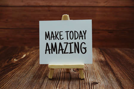 Make Today Amazing text on paper card on wooden backgroundの写真素材