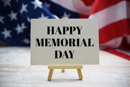 Happy Memorial Day text messege  with USA flag on wooden backgroundの写真素材