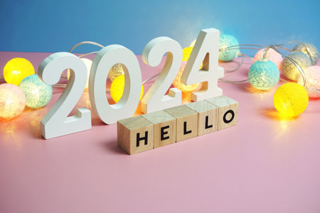 Hello 2024 word alphabet letters on pink and blue backgroundの写真素材
