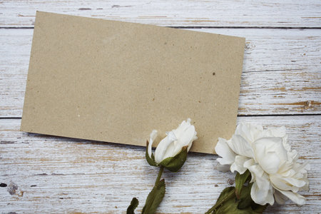 Space for copy background and flower decoration on wooden background