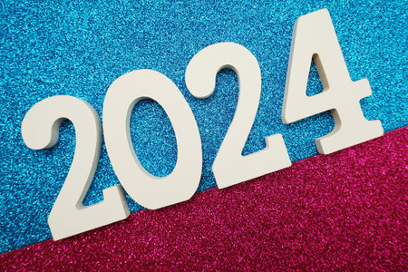 Happy New year 2024 with space copy on pink and blue glitter backgroundの写真素材