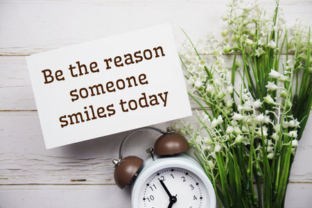 Be the reason someone smiles today text message motivational and inspiration quoteの写真素材