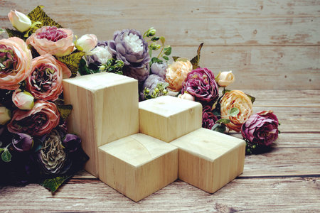 Wood podium presentation mock up with flower decoration