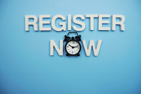 Register Now alphabet letters on blue background