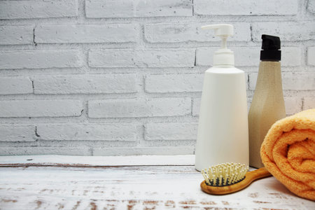 Clean towels, Shampoo, Liquid Soap with Other Toiletry and interior accessories with copy space