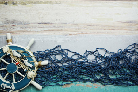 Nautical and summer background top view on wooden backgroundの写真素材