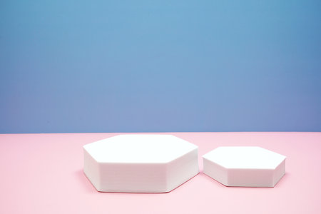 Podium display scene stage showcase front view with copy space on pink and blue backgroundの写真素材