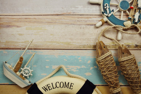Nautical and summer background top view on wooden backgroundの写真素材