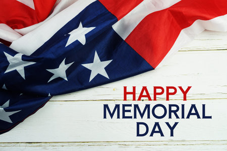 Happy Memorial Day text messege  with USA flag on wooden background