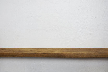 Home decoration accessories wooden shelves on white concrete wallの写真素材