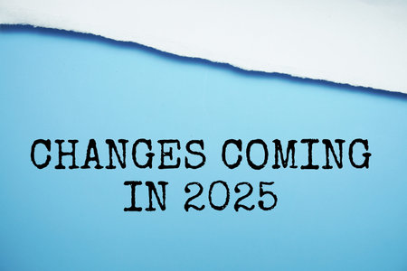 Changes Coming in 2025 text on blue background with white paper torn, New year resolutions and...