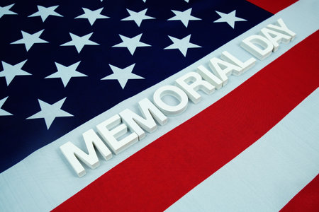 Happy Memorial Day alphabet letters with USA flag backgroundの写真素材