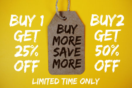 Buy 1 Get 25% off and Buy 2 Get 50% off with Buy More Save More on price tag on yellow backgroundの写真素材