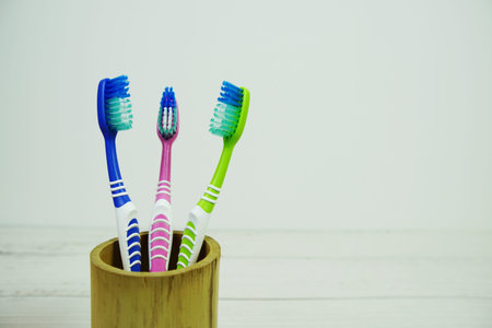 Toothbrush dental hygiene concept on wooden background