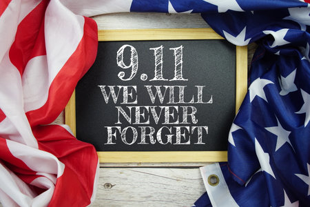 911 Patriot Day Never forget text message with USA flag on wooden backgroundの写真素材
