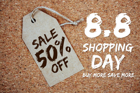 8.8 Shopping Day Sale 50% off with price tag on cork board backgroundの写真素材