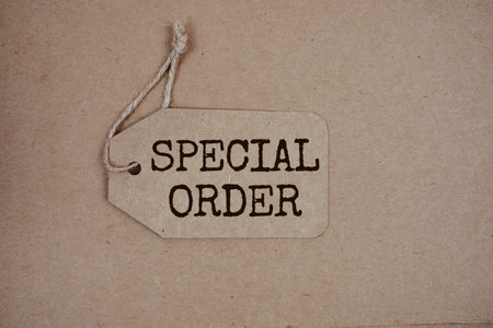 Special Order text on price tag with alarm clock on cork board backgroundの写真素材