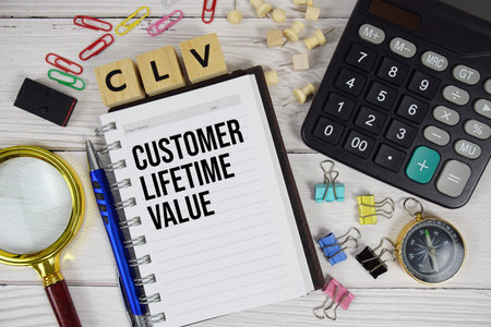 CLV - Customer Lifetime Value acronym on notepad, business and financial concept backgroundの写真素材