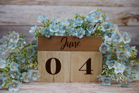 Wooden Calendar Showing the Date of June 4th. Day 4 of Juneの写真素材