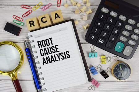 RCA - Root Cause Analysis acronym on notepad, business and financial concept backgroundの写真素材