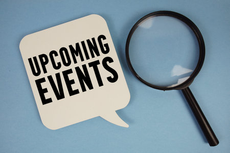 Upcoming Events text with magnifying glass on blue background