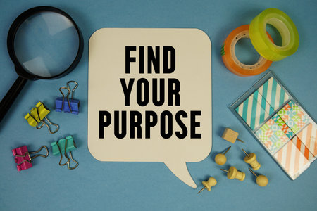 Find Your Purpose text with magnifying glass on blue backgroundの写真素材