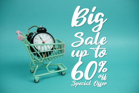Big Sale 60% off Promotion and Marketing with trolley shopping cart and alarm clock on blue...