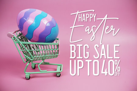 Easter Sale 40% promotion with Easter Egg and  trolley shopping cart decorations concept on pink backgroundの写真素材